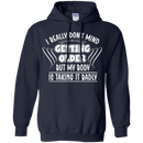 I really don't mind getting older but my body is taking it badly T-shirts CustomCat