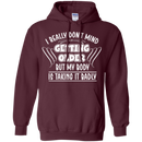 I really don't mind getting older but my body is taking it badly T-shirts CustomCat