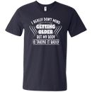 I really don't mind getting older but my body is taking it badly T-shirts CustomCat