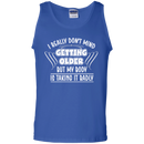 I really don't mind getting older but my body is taking it badly T-shirts CustomCat