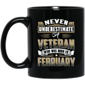 Veteran Coffee Mug Never Underestimate A Veteran Who Was Born In February 11oz - 15oz Black Mug CustomCat